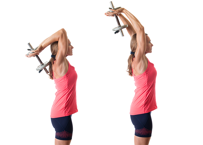 Woman performing a tricep extension as part of chest and triceps workout