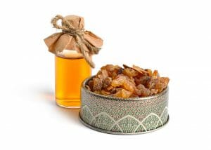 Bottle of myrrh essential oil to prevent skin aging