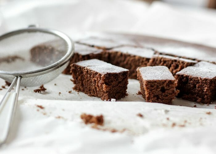 cocoa brownie bites on a white sheet