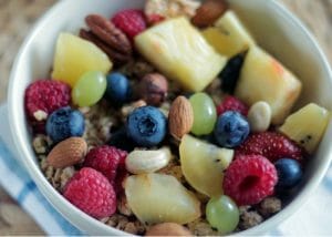 a bowl of fresh fruits and nuts