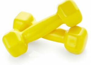 small yellow dumbbells used for desk exercises in the office