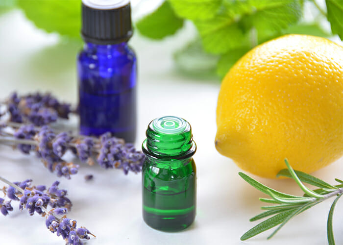 Homemade essential oils acne face toner with tea tree, lemon, and lavender essential oils, plus witch hazel