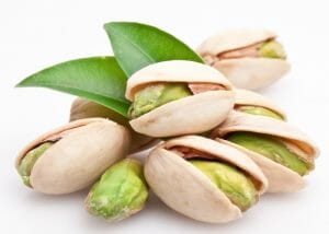 A pile of fresh pistachio nuts