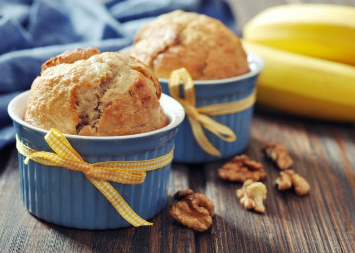 banana muffins in blue cupcake tins with pretty yellow ribbons