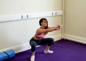 woman doing bodyweight squat butt exercises