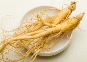 ginseng roots on a white dish